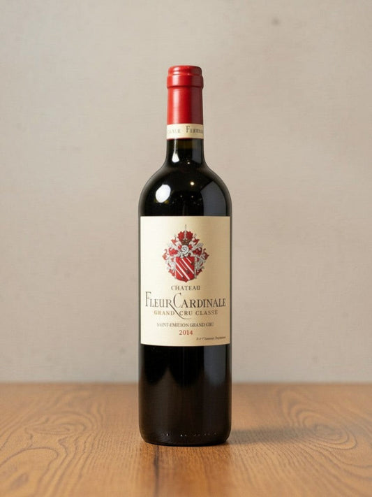 Goldener Zwilling Rotweinflasche Château Fleur Cardinale St. Emilion Grand Cru 2014 mit roter Kapsel