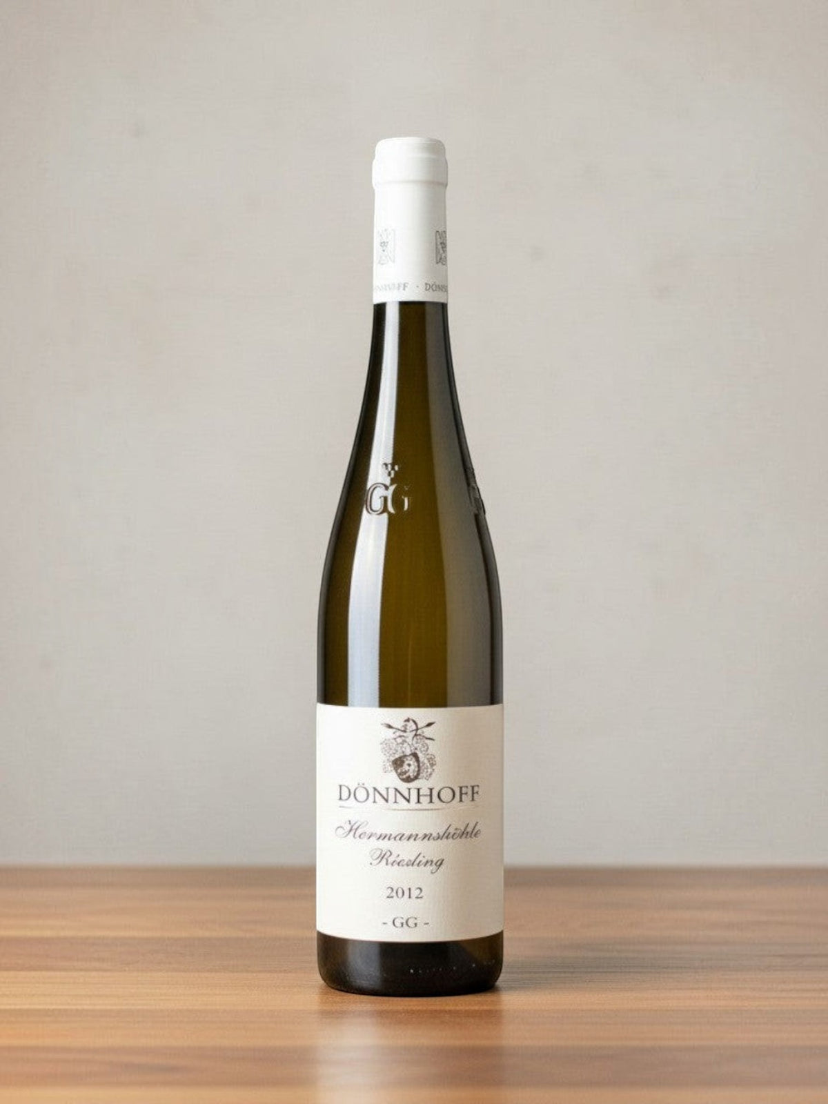 Goldener Zwilling Dönnhoff Hermannshöhle GG Riesling 2012 Weißweinflasche vor neutralem Hintergrund